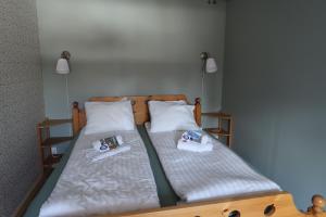 Postel nebo postele na pokoji v ubytování Hammarstrand B&B och lägenhet