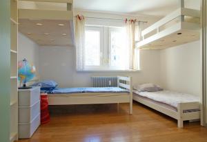 Ένα ή περισσότερα κρεβάτια σε δωμάτιο στο Apartment Haru