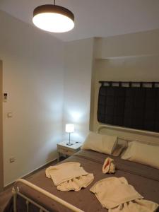 Postel nebo postele na pokoji v ubytování Annissa Appartment