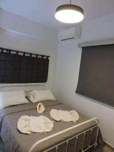 Postel nebo postele na pokoji v ubytování Annissa Appartment