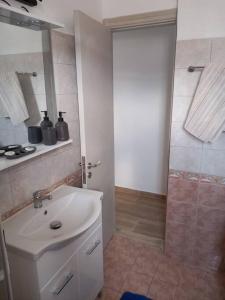 Koupelna v ubytování Annissa Appartment