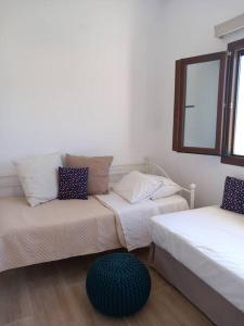 Postel nebo postele na pokoji v ubytování Annissa Appartment