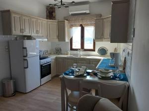 Kuchyň nebo kuchyňský kout v ubytování Annissa Appartment