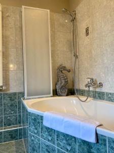 Koupelna v ubytování Ferienwohnung Schmidtalien + 15 fotografií