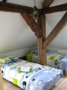 Ένα ή περισσότερα κρεβάτια σε δωμάτιο στο Torma Puhkemaja ja Glämping