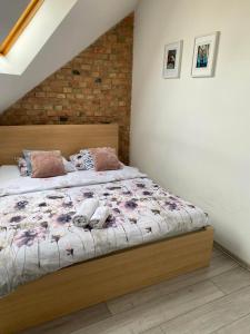 Posteľ alebo postele v izbe v ubytovaní Secret Apartament 2 Poznań