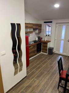 Kuchyň nebo kuchyňský kout v ubytování Apartma Mia