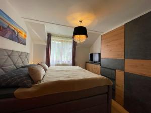 Postel nebo postele na pokoji v ubytování Vesterberg Apartments in Top Lage - Top Lage + 37 fotografií