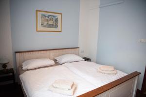 Ein Bett oder Betten in einem Zimmer der Unterkunft Appartements Clementina