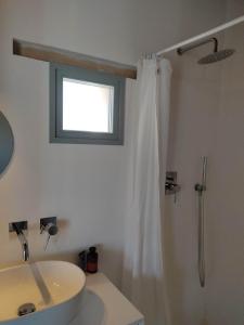 Koupelna v ubytování Casa Caminate CnC camera & cucina + 8 fotografií