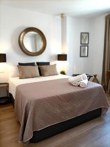 Posteľ alebo postele v izbe v ubytovaní The Secret Oasis Malaga