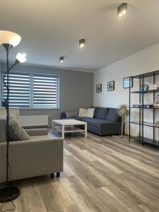 Posedenie v ubytovaní Uroczy apartament w ścisłym centrum Giżycka