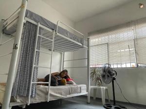 Postel nebo postele na pokoji v ubytování Vive Alegria Hostel