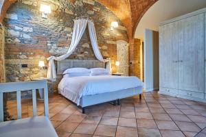 Podere Gli Olmi客房内的一张或多张床位