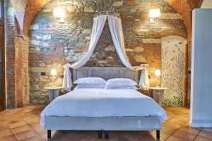 Podere Gli Olmi客房内的一张或多张床位