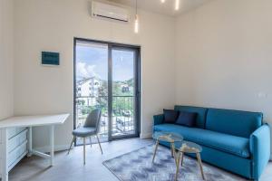 Posezení v ubytování Mini Condos® 13 D1 - Modern Studio with mezzanine