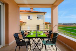 En balkon eller terrasse på Stancija Amoroso Porec Apartments