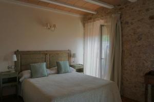 A bed or beds in a room at Can 28