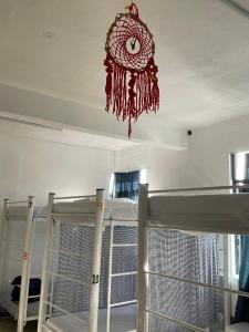 Postel nebo postele na pokoji v ubytování Vive Alegria Hostel
