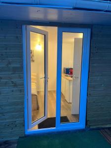 a sliding glass door of a room with a bedroom at Abrilove in Castres