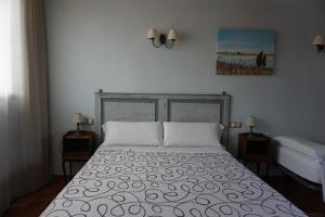 A bed or beds in a room at Can 28