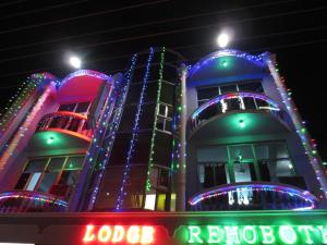 een gebouw met kerstverlichting 's nachts bij Hotel Rehoboth in Kanyakumari