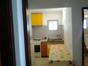 Kuchyň nebo kuchyňský kout v ubytování Apartments Ana + 37 fotografií