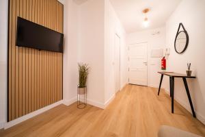 Telewizja i/lub zestaw kina domowego w obiekcie Acogedor apartamento en centro histórico Malaga