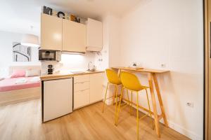 Kuchnia lub aneks kuchenny w obiekcie Acogedor apartamento en centro histórico Malaga