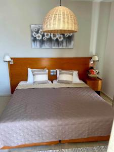 Posteľ alebo postele v izbe v ubytovaní Philippos Studios & Apartments