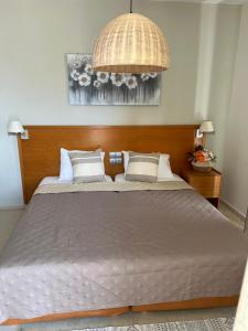 Posteľ alebo postele v izbe v ubytovaní Philippos Studios & Apartments