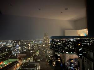 a view of a city skyline at night at WSP 3B2B apartment in CBD with free parking in Melbourne