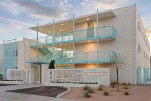 a building with balconies on the side of it at DTPH Modern Designer Studio - Pool & Parking - in Phoenix