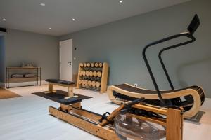 a room with a gym with a treadmill at Casa da Marechal - Boutique Hotel by Oporto Collection - Adults Only in Porto