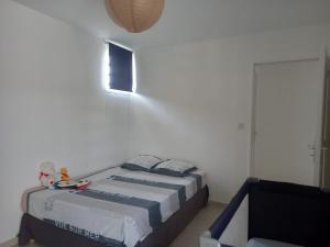 Beau duplex de standing, 120m2, vue mer, 4min plage客房内的一张或多张床位