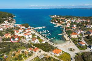 an aerial view of a small town with a marina at Kuca za odmor Davorka in Lukoran