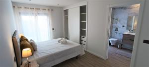 Postel nebo postele na pokoji v ubytování Faro Comfy Ensuite Guest House