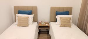 Postel nebo postele na pokoji v ubytování Faro Comfy Ensuite Guest House