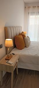 Postel nebo postele na pokoji v ubytování Faro Comfy Ensuite Guest House