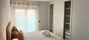 Postel nebo postele na pokoji v ubytování Faro Comfy Ensuite Guest House