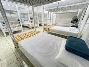 Postel nebo postele na pokoji v ubytování Vive Alegria Hostel