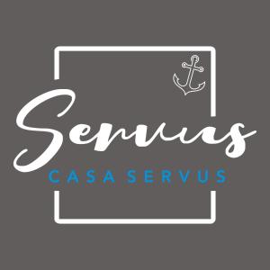 a sign that reads scrums as a scrumu at Casa Servus in Mamaia Nord