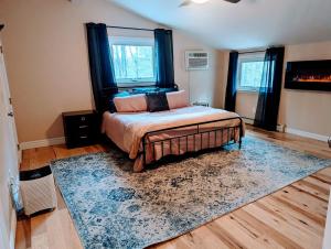 Ένα ή περισσότερα κρεβάτια σε δωμάτιο στο Spacious Pawtuckaway Getaway