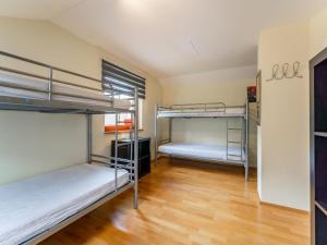 A bed or beds in a room at Wirnsberg