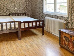 a room with two beds and a window at 4 person holiday home in HÖJE-By Traum in Höje
