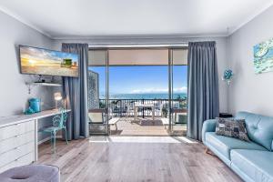 Posezení v ubytování Ocean View 16A Studio Pool & Spa Wi-Fi