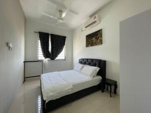 En eller flere senge i et værelse på Sunny Seaview@Icon Residence + 115 billeder