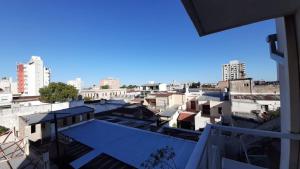 a view of the city from a balcony at EXCELENTE UBICACIÓN in Concordia