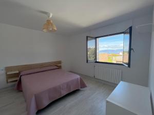 Posteľ alebo postele v izbe v ubytovaní Casa Rosquillas