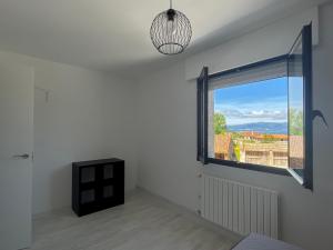 Televízia a/alebo spoločenská miestnosť v ubytovaní Casa Rosquillas